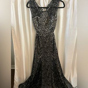 Long beautiful lace dress with front and back slits and back cutout
